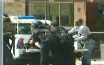 Balean policía en protesta en la UASD; se lo lleva en camioneta