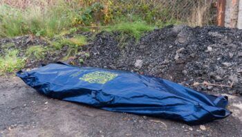 Hallan cadáver dentro de un saco en Santiago