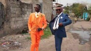 Vivir en medio del hambre con trajes de Gucci y zapatos de cocodrilo: la exótica costumbre de “Los Dandis del Congo”