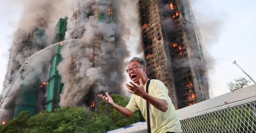 Al menos cuatro muertos y varios atrapados en un feroz incendio en Hong Kong